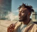 Person vaping CBD cart legally in the UK
